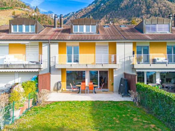 Maison mitoyenne avec jardin privatif