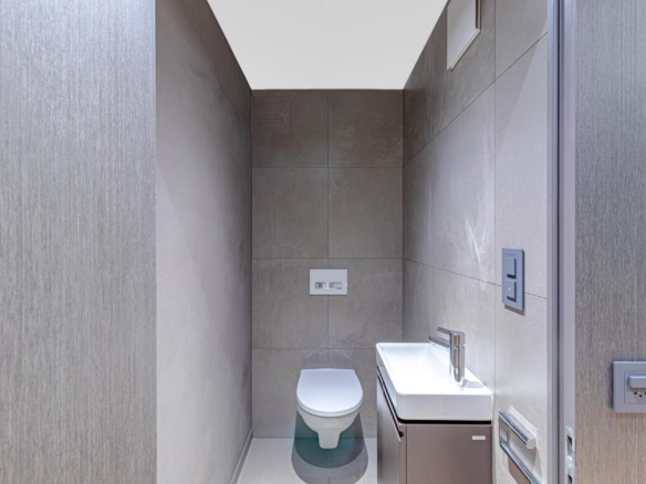 WC invités avec vasque et finitions en béton ciré