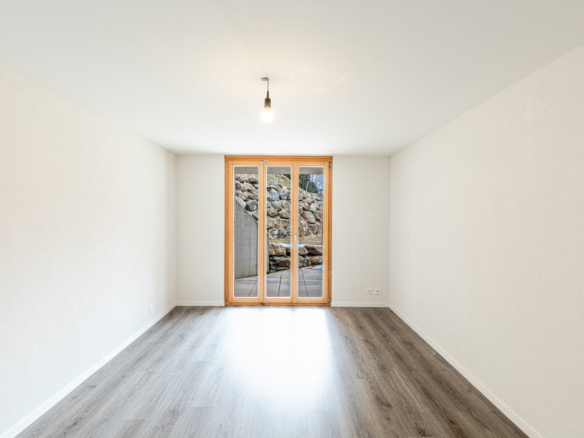 Deuxième chambre à Les Mosses avec sol en parquet